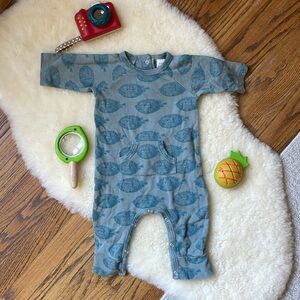 Kate Quinn puffer fish one piece suit